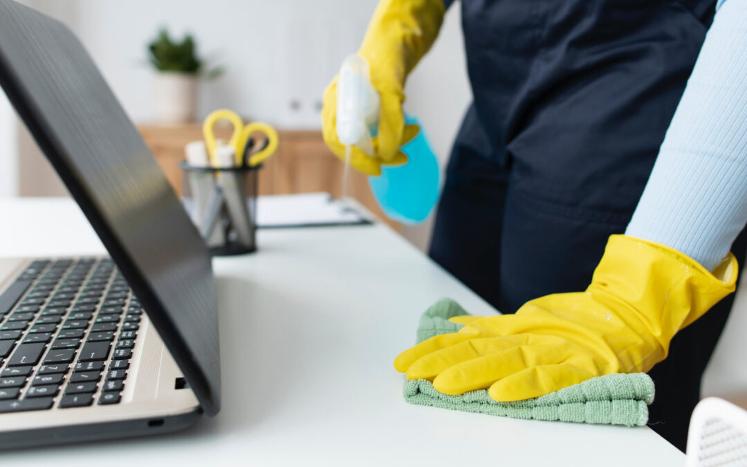 Magenta Cleaning sanitizing desk & laptop